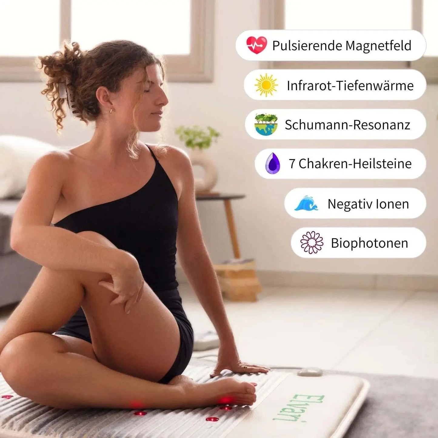 Frau auf Kristallmatte 2.0 mit Infrarot-Tiefenwärme, Magnetfeld und 7 Chakren-Heilsteinen. Ideal für therapeutische Anwendungen zu Hause.